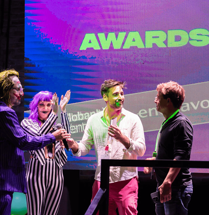 Speaker addressing the audience at the innovation event.